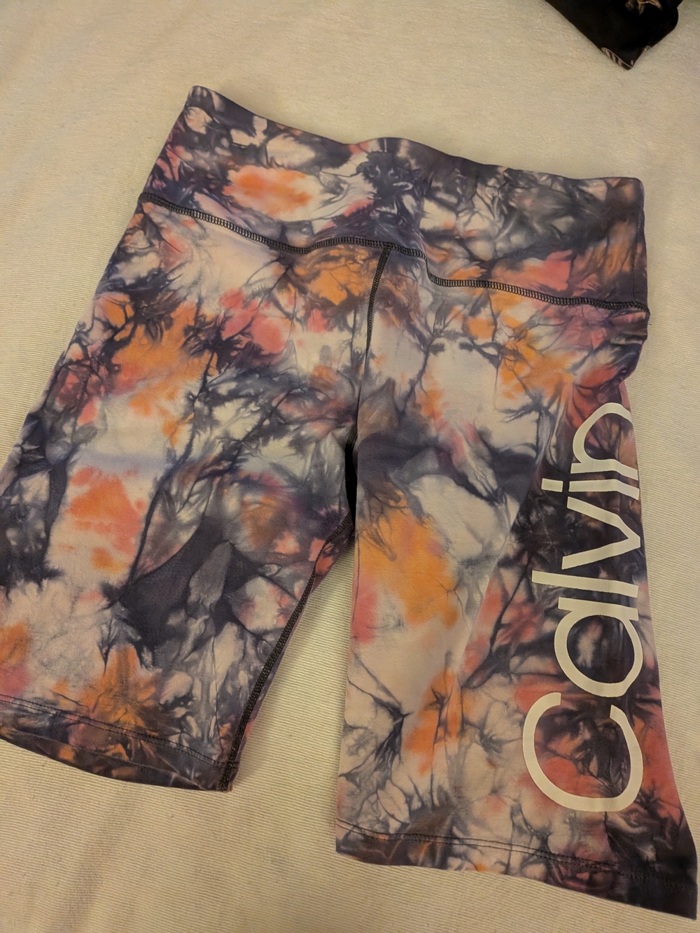 Calvin Klein Performance Tie-Dye Active Shorts in Purple & Orange